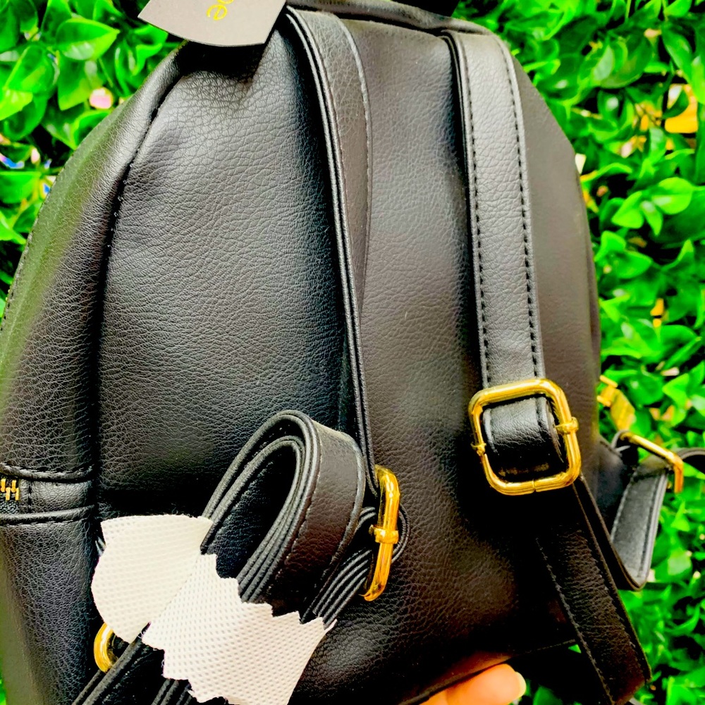 BEBE , Saddie studded mini backpack black.